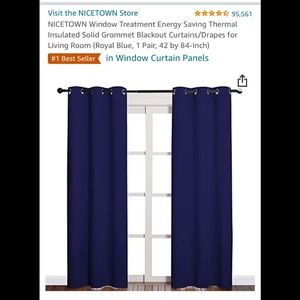 A pair of brand new navy drapes from Amazon.